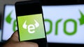 etoro app monitor - E-Toro is an app to check equities rates trader broker workers stock exchange market smartphone