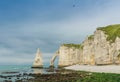 Etretat Aval cliff, rocks and natural arch landmark and blue ocean. Aerial view. Normandy, France, Europe Royalty Free Stock Photo
