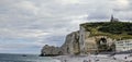 Etretat natural rock arch and its beach. Normandy, France Royalty Free Stock Photo