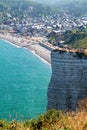Etretat Normandy France. Tourists on top of the chalk cliffs