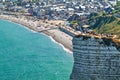 Etretat Normandy France. Tourists on top of the chalk cliffs
