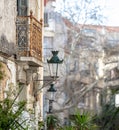 ÃÂ¡etro house, old metal hanging lantern, rusty iron balcony background Royalty Free Stock Photo