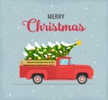 etro red pickup truck with christmas tree Royalty Free Stock Photo