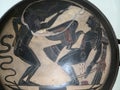 Etruscan black painted figure pottery cup Royalty Free Stock Photo