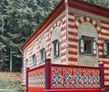 Oblique view of the Moroccan pavilion in the park of Schloss Linderhof, with the typical red and white stripes of North African