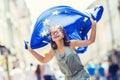 EU Flag. Cute happy girl with the flag of the European Union. Young teenage girl waving with the European Union flag in the city Royalty Free Stock Photo