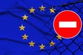 eu flag on satin, fence with barbed wire, symbolic red sign no entry, entry is prohibited, travel restrictions across European