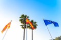 EU flag Spanish flag local Ibiza flag waving in the wind on blue sky background-3.psd Royalty Free Stock Photo