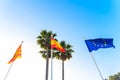 EU flag Spanish flag local Ibiza flag waving in the wind on blue sky background-3.psd Royalty Free Stock Photo