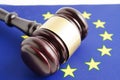 EU law, Legal, justice and agreement, wooden court gavel on flag Royalty Free Stock Photo