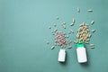 Eucalyptus extract capsules, pills, tabletes over green background with copy space. Prevention and health concept. Alternative Royalty Free Stock Photo