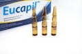 Eucapil box, fluridil lotion in set of ampules, cosmetic product for topical use in Royalty Free Stock Photo