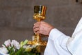 Eucharist ceremony during mass. Catholic ritual.