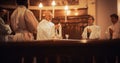 The Eucharist Service In Grand Church: Ministers of Christian Faith lead The Ceremony that Involves