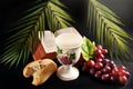 Eucharist symbol with bread grape and chalice on black background