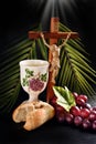 Eucharist symbol with bread grape and cross with Jesus on black background