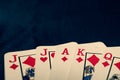 Red euchre diamond hand on black background Royalty Free Stock Photo