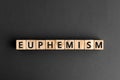 Euphemism - word from wooden blocks with letters