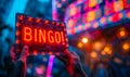 Euphoric moment captured as hands hold up a BINGO! sign, embodying the thrill of winning, set against a vibrant, multicolored