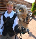 Eurasian eagle owl with trainer Royalty Free Stock Photo