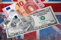 Euro and american dollar on British flag Royalty Free Stock Photo