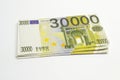 30000 euro bancnote on white background as concept for inflation, depreciation, economic crisis thematics
