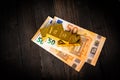 Euro bank notes and gold bars on table - economy concept theme Royalty Free Stock Photo