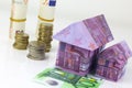 Euro bank notes House and coins