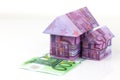 Euro bank notes House and coins