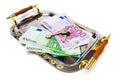 Euro bank notes and keys on a metal tray Royalty Free Stock Photo