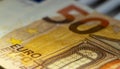 Euro banknote details in a macro shot. Closeup, selective focus. Europe finance background. Business symbol Royalty Free Stock Photo