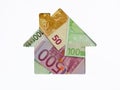 Euro banknote in shape of house on white background. Concept of Investment property, Mortgage concept. Investment risk Royalty Free Stock Photo