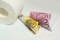 Euro banknote and toilet paper Royalty Free Stock Photo