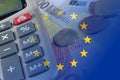 Euro banknotes, coins, calculator, eu flag Royalty Free Stock Photo