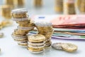 Euro banknotes and coins togetger on white table - close-up Royalty Free Stock Photo