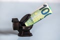 Euro banknotes down to the toilet, concept and symbolic