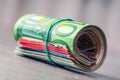 Euro banknotes. Euro currency. Euro money. Close-up Of A Rolled Euro Banknotes On concrete or Wooden table Royalty Free Stock Photo