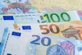 Euro banknotes on Europe world globe map. Royalty Free Stock Photo