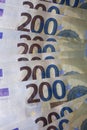 200 euro banknotes european bill cash money isolated on black background two hundred euro close up modern high quality instant Royalty Free Stock Photo