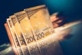 Euro Banknotes on Glassy Table