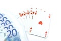 Euro banknotes and holdem poker cards