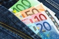 Euro banknotes in jeans pocket