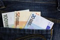 Euro banknotes in jeans pocket