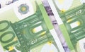 Euro banknotes obscure pound banknotes