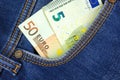 Euro banknotes in a pocket of blue jeans close-up photo, business money background Royalty Free Stock Photo