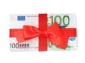 100 Euro banknotes with red ribbon isolated on white, top view. Money exchange Royalty Free Stock Photo