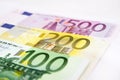 100, 200 and 500 euro banknotes on white. Close-up. Royalty Free Stock Photo
