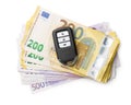 Euro banknotes and wireless car key Royalty Free Stock Photo