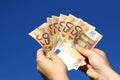 Euro banknotes in woman hand Royalty Free Stock Photo