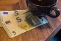 Euro banknotes, bill checking or Money tips.